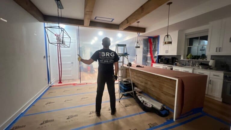 BRG technician protecting a kitchen work area during property restoration