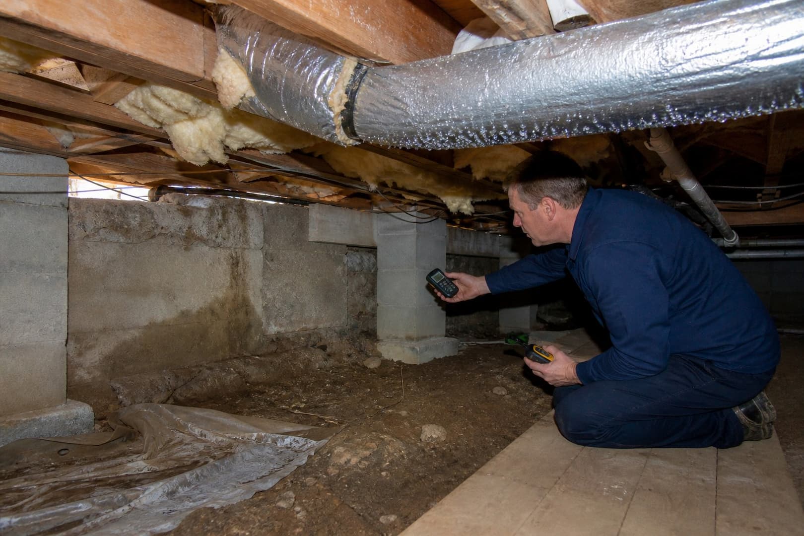 Crawl-space inspection mapping ground vapor, foundation seepage, duct condensation, and rim-joist air leakage