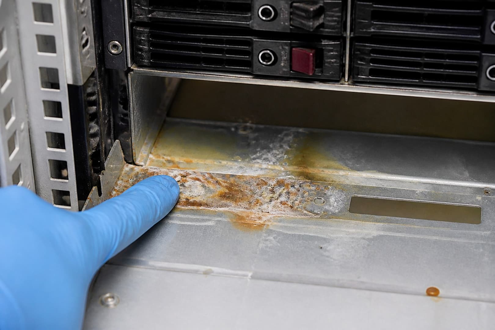 BRG restoration team setting a contained drying zone in a commercial technical room — close technical detail
